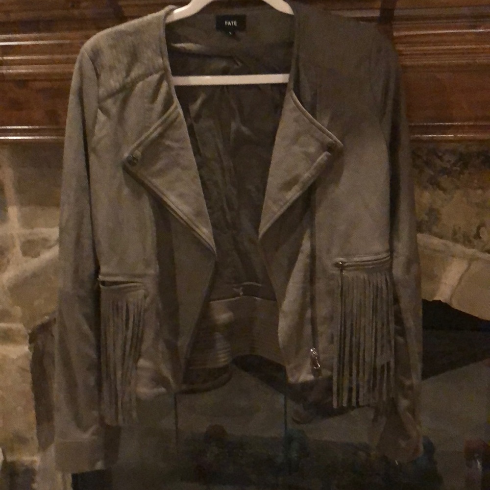 Fate. Faux suede olive green jacket with fringes and zippered pockets.